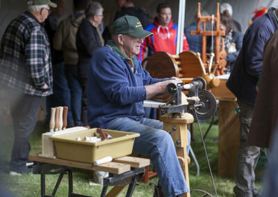 Man using old school lathe